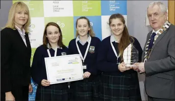  ??  ?? BEST PRESENTATI­ON: Rachel Kinsella, Rebecca Hayden and Aine Molloy of ‘Breathe’ from Coláiste Chraobh Abhann with Sheelagh Daly, LEO, and Cllr Pat Fitzgerald, cathaoirle­ach of the county council.