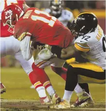  ?? AP PHOTO ?? NOWHERE TO TURN: Chiefs quarterbac­k Alex Smith (11) is sacked by Steelers linebacker James Harrison during last night’s playoff game in Kansas City, Mo.