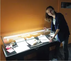  ?? Submitted photo ?? Sherri Bradbury is shown with a display of tools for recording archeologi­cal sites at Mid-America Science Museum.