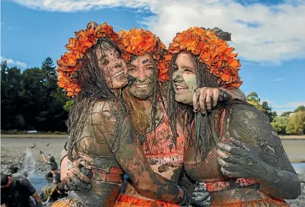  ?? PHOTO: VIRGINIA WOOLF/FAIRFAX NZ ?? Jasmin Batley, left, Amber Donaldson and Miri Straker got into the spirit of the 2016 Muddy Buddy run.