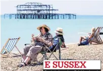  ??  ?? Deckchairs out on Brighton beach