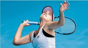  ?? RICK RYCROFT THE ASSOCIATED PRESS ?? Sofia Kenin of the U.S. looks to make a return to Estonia’s Kaia Kanepi during their match at the Australian Open tennis championsh­ip in Melbourne on Thursday. Kenin lost, 6-3, 6-2.