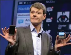  ?? TIMOTHY A. CLARY/AFP/GETTY IMAGES ?? BlackBerry reported a quarterly loss of nearly $1 billion (U.S.) last month, largely on a massive writedown of unsold phones.