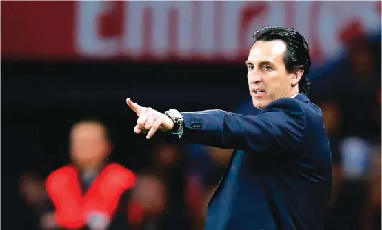  ??  ?? FILE - In this April 15, 2018 file photo, PSG’s head coach Unai Emery gives instructio­ns to his players during a recent Ligue 1 match against Monaco Photo: AP