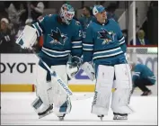  ?? NHAT V. MEYER — BAY AREA NEWS GROUP ?? Sharks goaltender MacKenzie Blackwood (29) and San Jose Sharks goaltender Kaapo Kahkonen (36) skate off the ice following their 2-1 win over the Philadelph­ia Flyers at the SAP Center in San Jose on Tuesday.