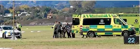  ?? CAMERON AVERY/SUNLIVE ?? Emergency services at Tauranga Airport on Saturday morning, where a fatal skydiving incident occurred.