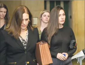  ?? David Dee Delgado / Getty Images ?? Key prosecutio­n witness Jessica Mann, right, arrives at Manhattan criminal court to testify at the sex assault trial of Harvey Weinstein on Friday in New York City.