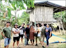  ?? ?? The Sama Sama residency artists and Forever Sabah representa­tives in a group photo, taken during their visit to the rural community of Tengilang.