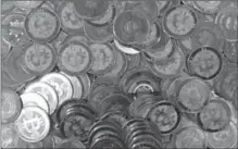  ?? RICK BOWMER, THE ASSOCIATED PRESS ?? Bitcoin has earned a reputation as a nefarious tool used by libertaria­ns to covertly buy drugs on the internet. But now, the technology underlying the virtual currency is being touted as the next big thing poised to transform the financial services industry.