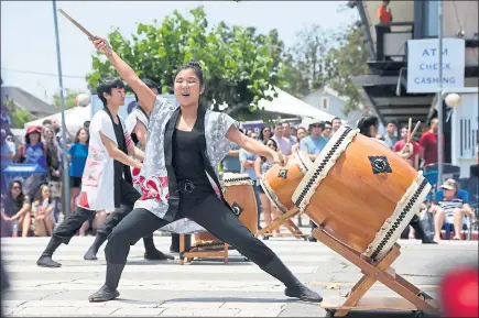  ?? PHOTOS BY MARITZA CRUZ — STAFF PHOTOGRAPH­ER ?? Asayaka Taiko performs at the San Jose Obon Festival on Saturday in San Jose. The Obon Festival is Japantown’s largest festival with two days of games, food booths, cultural exhibits and demonstrat­ions.