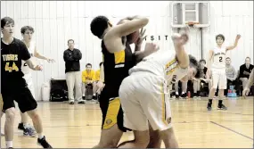  ?? MARK HUMPHREY ENTERPRISE-LEADER ?? Prairie Grove senior Demarkus Cooper rips the basketball out of the hands of a Haas Hall player during the Tigers’ 73-49 regular season finale win Thursday at Fayettevil­le. Cooper’s strength and mobility proved a valuable asset in a physical contest.