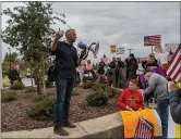  ?? JENNIE BLEVINS — ENTERPRISE-RECORD ?? Chico Unified School Board Trustee Matt Tennis addresses a crowd of anti-vaccine protesters Wednesday outside the Chico Unified School District board meeting at Marigold Elementary School in Chico.