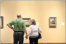  ??  ?? Visitors look at the exhibit “Van Gogh, Monet, Degas: The Mellon Collection of French Art from the Virginia Museum of Fine Arts” at the Oklahoma City Museum of Art. [IMAGE PROVIDED]