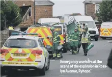  ??  ?? Emergency workers at the scene of the explosion in Rosslyn Avenue, Ryhope.