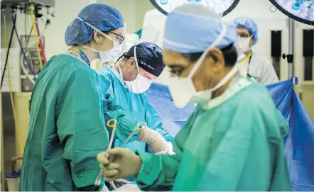  ?? PHOTOS: BEN NELMS ?? Dr. Martin Gleave performs prostate surgery on a patient at the Vancouver General Hospital. During the fiscal year 2016-17, 969 radical prostatect­omies were performed on B.C. residents.