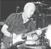  ?? ?? British guitarist Mark Knopfler performs during the 44th Montreux Jazz Festival in Montreux July 15, 2010. (Reuters photo)