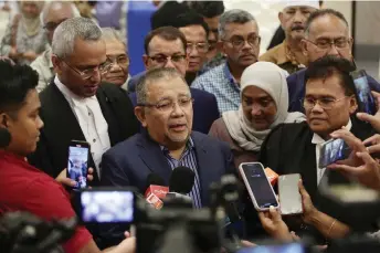  ?? — Bernama photo ?? Mohd Isa speaks to reporters following the appellate court’s decision.