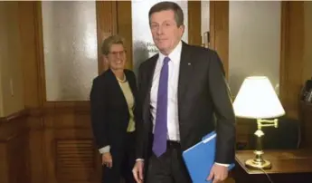  ?? CHRIS YOUNG/THE CANADIAN PRESS FILE PHOTO ?? Mayor John Tory’s request for help from Premier Kathleen Wynne with funding for social housing has escalated.