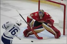  ?? WILFREDO LEE — THE ASSOCIATED PRESS ?? Toronto Maple Leafs right wing Mitch Marner (16) attempts a shot at Florida Panthers goaltender Anthony Stolarz (41) during the first period of an NHL hockey game, Tuesday, April 16, 2024, in Sunrise, Fla.