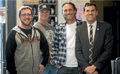  ??  ?? Tuatara craft beer ambassador Will Keys, left, Tuatara head brewer Carl Vasta and Black Dog Brewery top dog Adrian Klemp hosted a brew day for their First Responder beer and invited Wellington mayor Justin Lester to chip in.