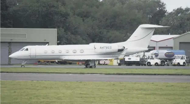  ??  ?? 0 A ‘mysterious’ Gulfstream aircraft suspected of being used in the US government’s controvers­ial ‘extraordin­ary rendition’ programme on the tarmac at Prestwick