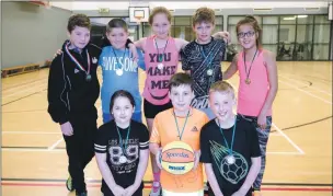  ??  ?? The winners of the morning sessions were Viktorja Ludborza, Liam Martin, Jack Fairburn and Nerea Hall Seoane from Lundavra, Karla Donaldson and Jamie McMaster from Caol and Calum MacLean from St Columba’s with S2 team manager Aidan Love.