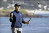  ?? ERIC RISBERG — THE ASSOCIATED PRESS ?? Jordan Spieth reacts on the 18th green of the Pebble Beach Golf Links after winning the AT&amp;T Pebble Beach National Pro-Am golf tournament Sunday in Pebble Beach.