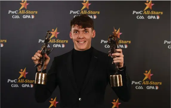  ??  ?? David Clifford with his All Star award and Young Player of the Year award at the PwC All Stars 2018 at the Convention Centre in Dublin. Photo by Sportsfile