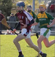  ??  ?? Joe Mernagh (St. Martin’s) is pursued by Ben Martin (HWH-Bunclody).