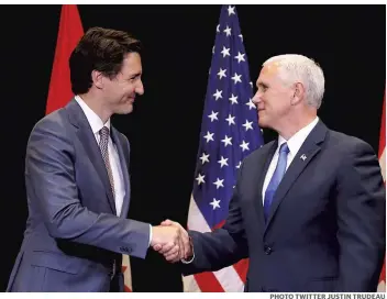  ?? PHOTO TWITTER JUSTIN TRUDEAU ?? Le premier ministre Justin Trudeau et le vice-président des États-Unis se sont rencontrés, hier, à Providence, au Rhode Island, pour discuter entre autres de bois d’oeuvre.