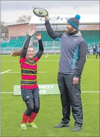  ??  ?? Greg Peterson having fun last week with Oban High School’s Eve Campbell at Scotstoun.
