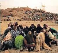  ?? Pictures: GREG MARINOVICH ?? SIMMERING TENSION: Lonmin employees gather on a hill called Wonderkop at Marikana, near Rustenburg in North West, before the mass shooting