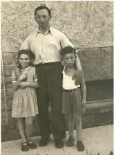  ?? (Photos: Courtesy) ?? HENRYK AND Hanna Arfa, the writer’s grandparen­ts, after the war. (Orit Arfa)
ISRAELI SPECIALIST in Polish citizenshi­p Anat Shem-Or (as a child) with her brother and father after the war.