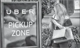  ?? Robert Gauthier Los Angeles Times ?? UBER first announced the emergency feature in April, weeks before a CNN report that more than 100 Uber drivers had been accused of sexual assault or abuse.