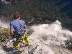  ?? AP PHOTO VIA PETER ZABROK ?? In this photo provided by Peter Zabrok, climber Ryan Sheridan who had just reached the top of El Capitan, a 7,569-foot formation, when a rock slide let loose below him Thursday in Yosemite National Park.