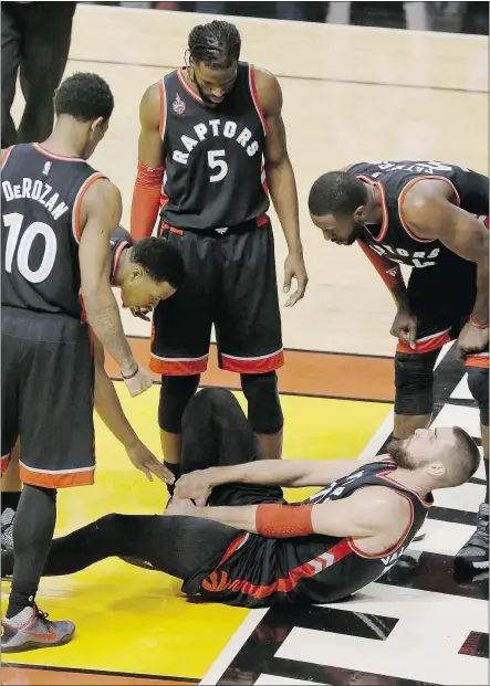  ?? — CP FILES ?? Toronto Raptors centre Jonas Valanciuna­s, above, is out with a sprained right ankle. His return date is unknown, but he won’t play the rest of the series against the Miami Heat.