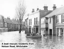  ?? ?? A boat rescues residents from Nelson Road, Whitstable