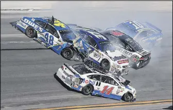  ?? JERRY MARKLAND / GETTY IMAGES ?? Wrecks involved several big names at the Daytona 500, including Jimmie Johnson (48), Kevin Harvick (4), Danica Patrick (10) and Clint Bowyer (14).