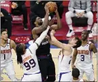  ?? MATT SLOCUM - THE ASSOCIATED PRESS ?? With three starters resting to get healthy for the stretch run, it’s no surprise that 76ers center Joel Embiid drew a lot of attention from the visiting Phoenix Suns Wednesday night.