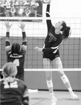  ?? STEPHEN M. DOWELL/STAFF PHOTOGRAPH­ER ?? West Orange outside hitter Taylor Head (7) spikes the ball during a recent game against Windermere High. Taylor has 240 kills, 168 digs, 58 aces and 26 blocks this season.