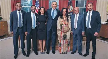  ??  ?? MULUGHETA, his siblings and his parents are pictured in the Oval Office with President Obama. David Mulugheta, the son of Eritrean immigrants, has become one of the industry’s most powerful agents.