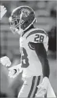  ?? Chris Coduto Getty Images ?? ACA’CEDRIC WARE of USC heads to the sideline after scoring in the fourth quarter.