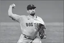  ?? JULIO CORTEZ/AP PHOTO ?? In this Aug. 20, 2020, file photo, Boston Red Sox pitcher Nathan Eovaldi throws to the Baltimore Orioles during a game in Baltimore.