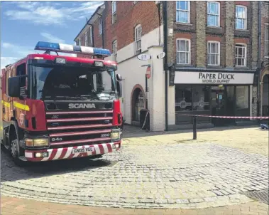  ??  ?? Firefighte­rs were called to tackle a blaze in a flat above the Paper Duck restaurant in Ashford