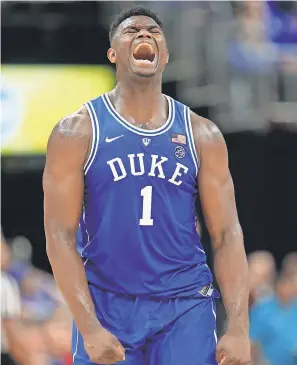  ?? ANDY LYONS/GETTY IMAGES ?? Duke freshman Zion Williamson scored 28 points in his debut against Kentucky during the State Farm Champions Classic on Tuesday.