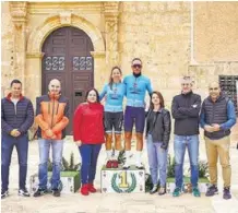  ?? ?? LOS GANADORES Miguel Ángel Juan y María García en el podio de La Vuelta Ciclista a Almería 2024.