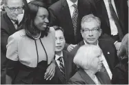  ?? NATHAN DENETTE/ THE CANADIAN PRESS ?? Mitzie Hunter, left, is associate minister of finance who’ll work on the proposed Ontario Retirement Pension Plan.