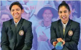  ??  ?? Harmanpree­t Kaur ( left) and Mithali Raj are all smiles in this file photo.