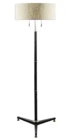  ?? HOUZZ ?? Uttermost’s rust-black, fluted metal-base floor lamp