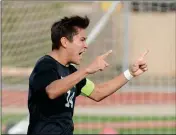  ?? Buy these photos at YumaSun.com PHOTOS BY RANDY HOEFT/YUMA SUN ?? ABOVE: GILA RIDGE’S IAN MEZA celebrates scoring the third goal for the Hawks during the second half of Saturday afternoon’s Arizona Interschol­astic Associatio­n 4A Division Boys Soccer State Championsh­ip game at Williams Field High School in Gilbert. The Hawks won 3-0. RIGHT: Gila Ridge’s Ian Meza (right) is congratula­ted by teammates after Meza scored the third goal for the Hawks during the second half.